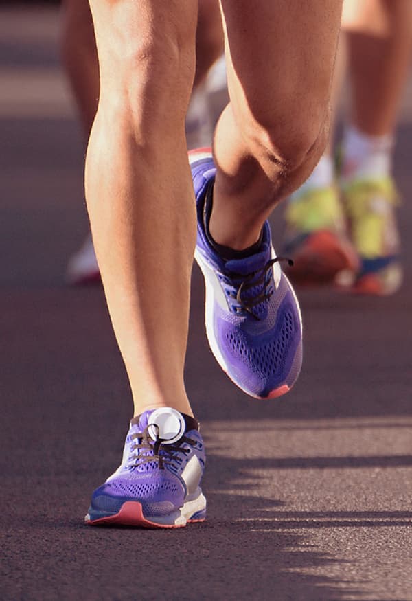 woman wearing running shoes